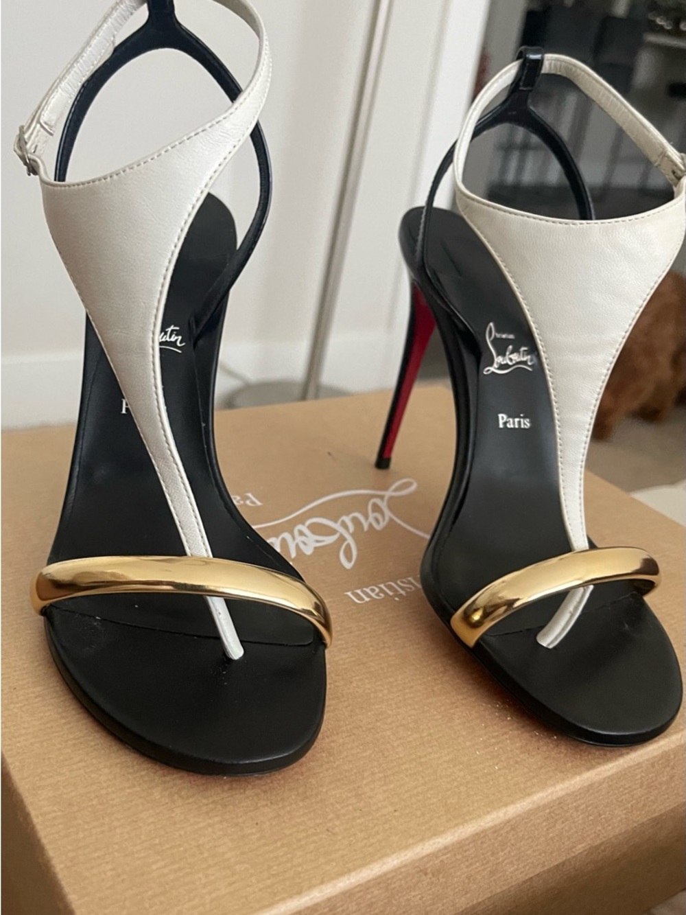Christian Louboutin Black and Gold Heels